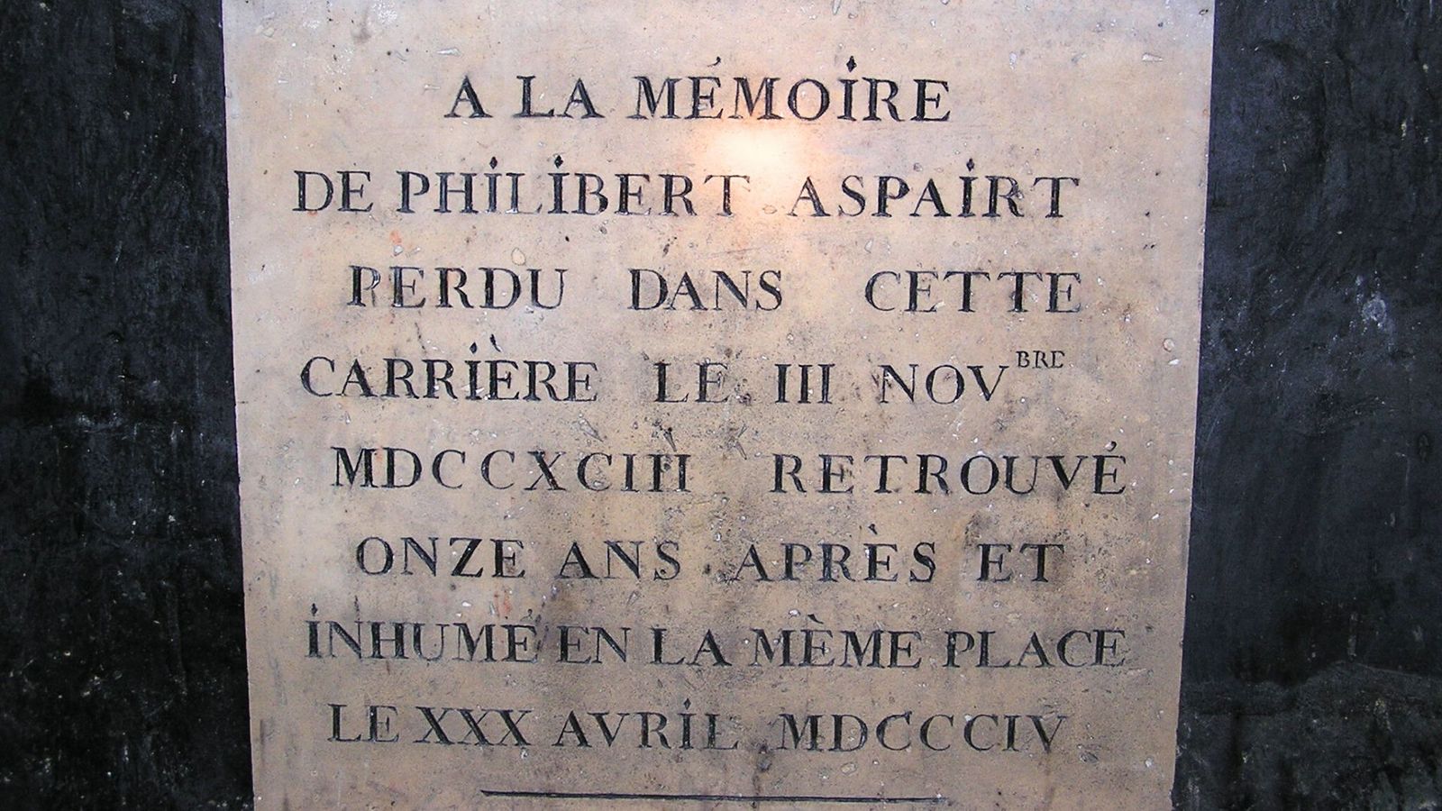 Philibert Aspairt stone in Paris Catacombs
